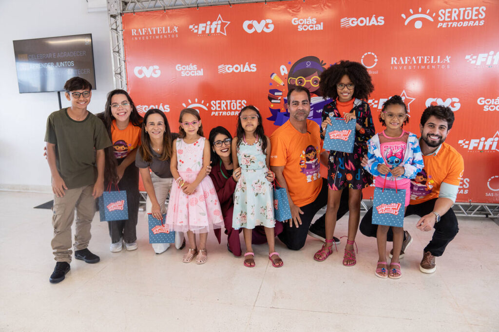 Children from a local community holding Sertões awards
